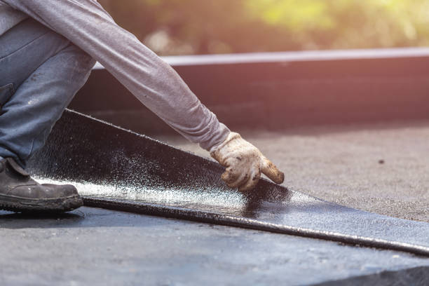 Professional Basement Waterproofing technician working in Lewis Center, OH